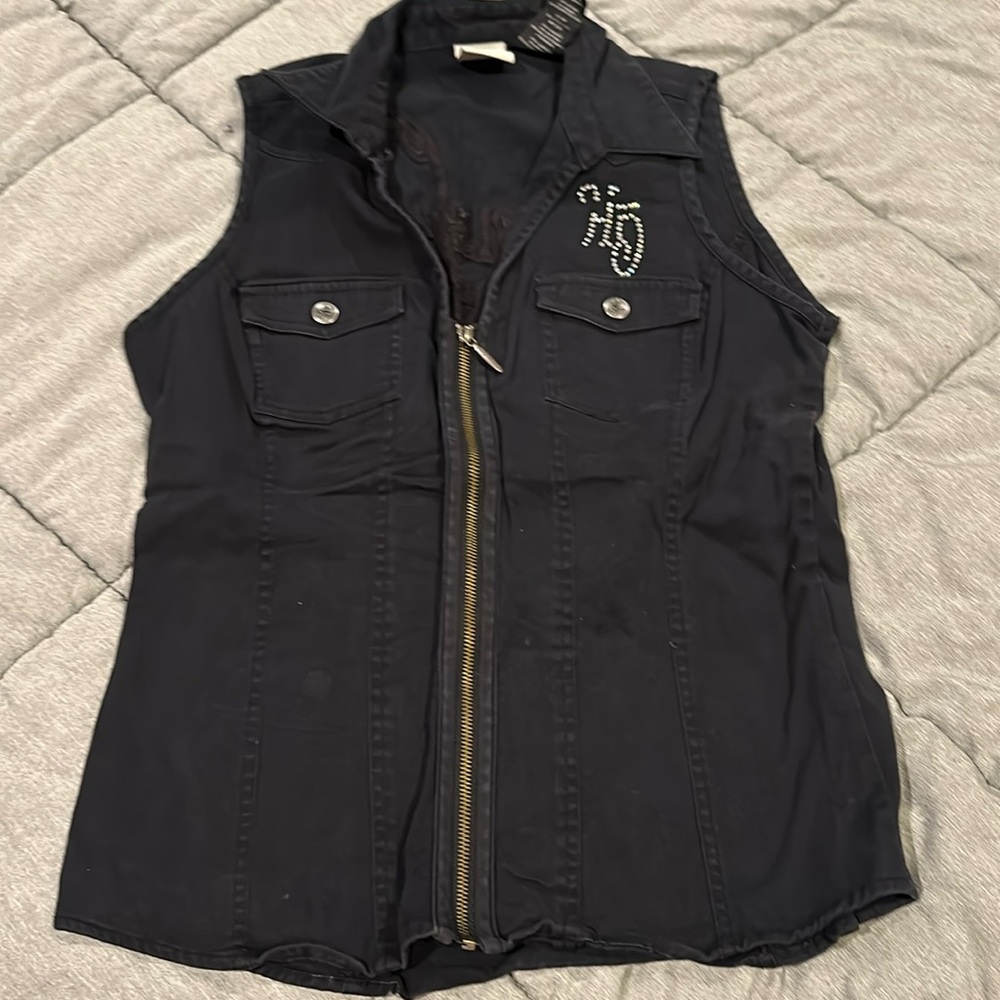 Harley-Davidson. No sleeve zip up top. Missing some bling on the front.